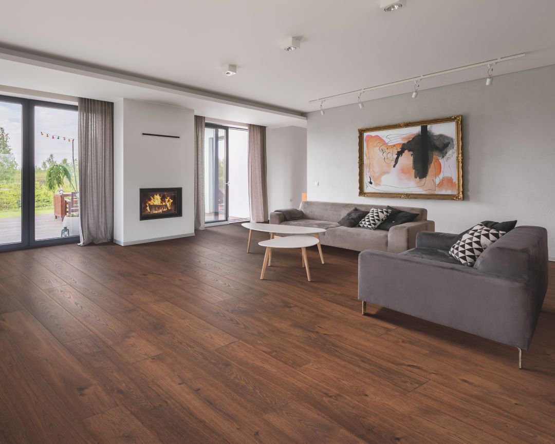 Hardwood flooring extending from the living room to the kitchen